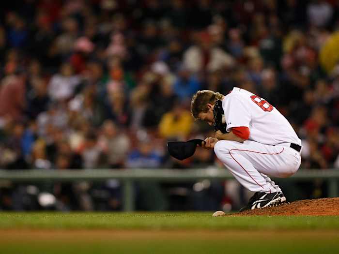 Daniel Bard crouching on the mound